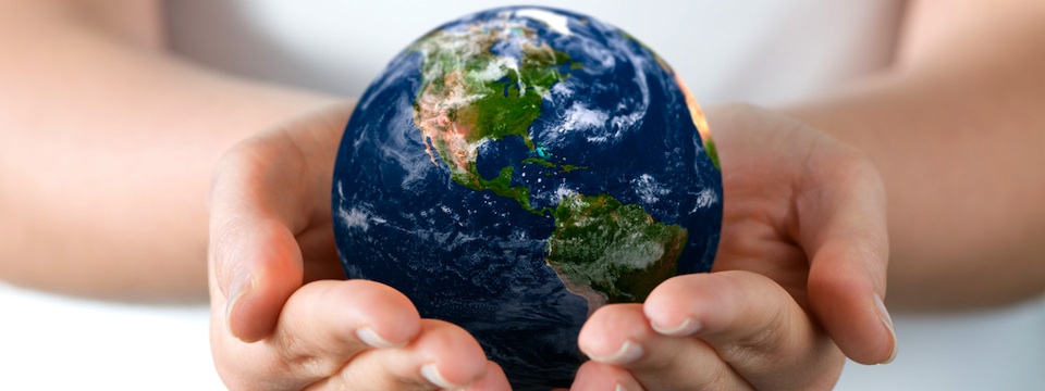 holding_earth_in_hands_960x360